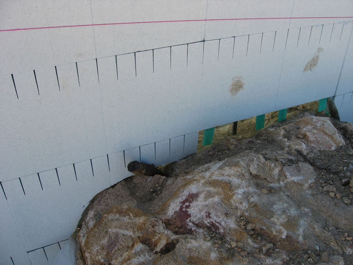 Quad-Lock ICF Home Built on the Rocks - how to build around rocks - Energywise Sustainable Products CO