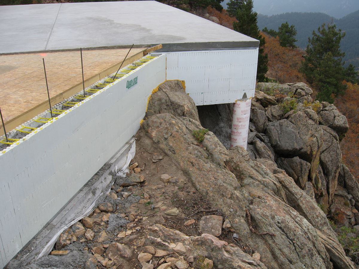 Quad-Lock ICF Home Built on the Rocks - building around rocks - Energywise Sustainable Products CO